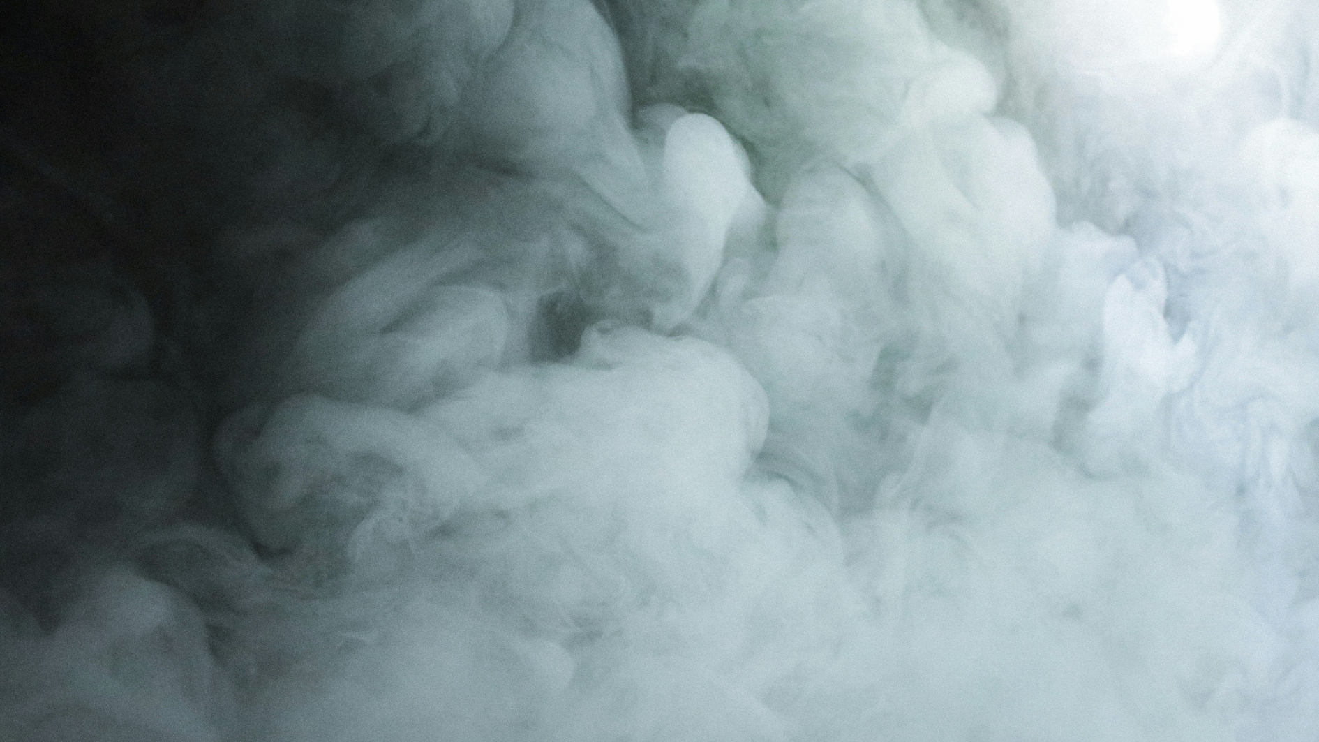 a close up image of grayish blue smoke