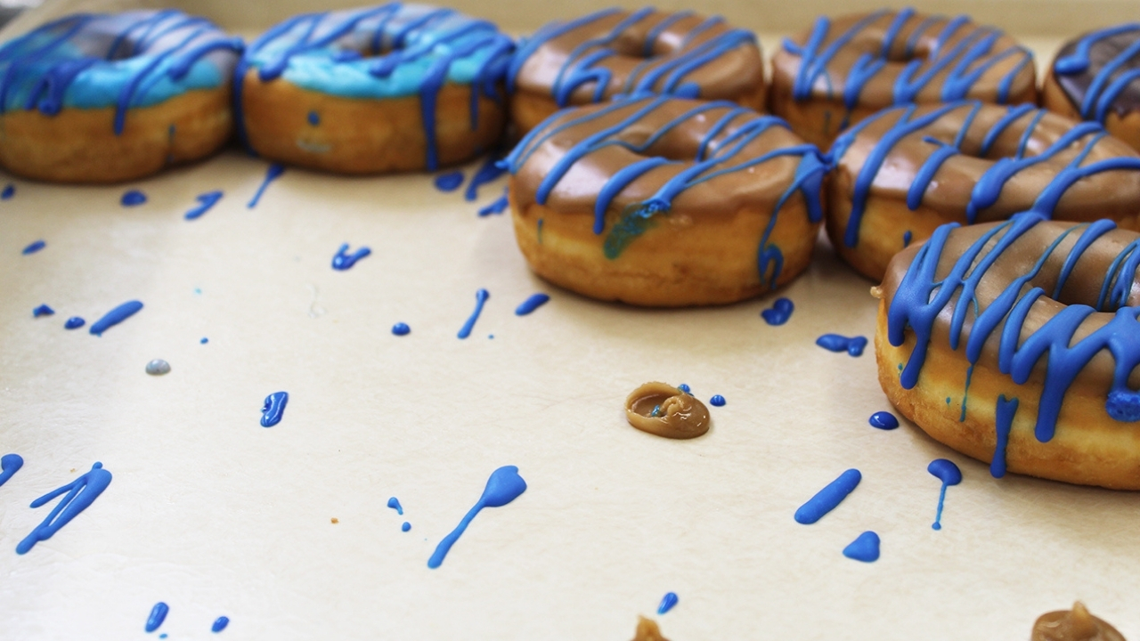Donuts drizzled with blue icing
