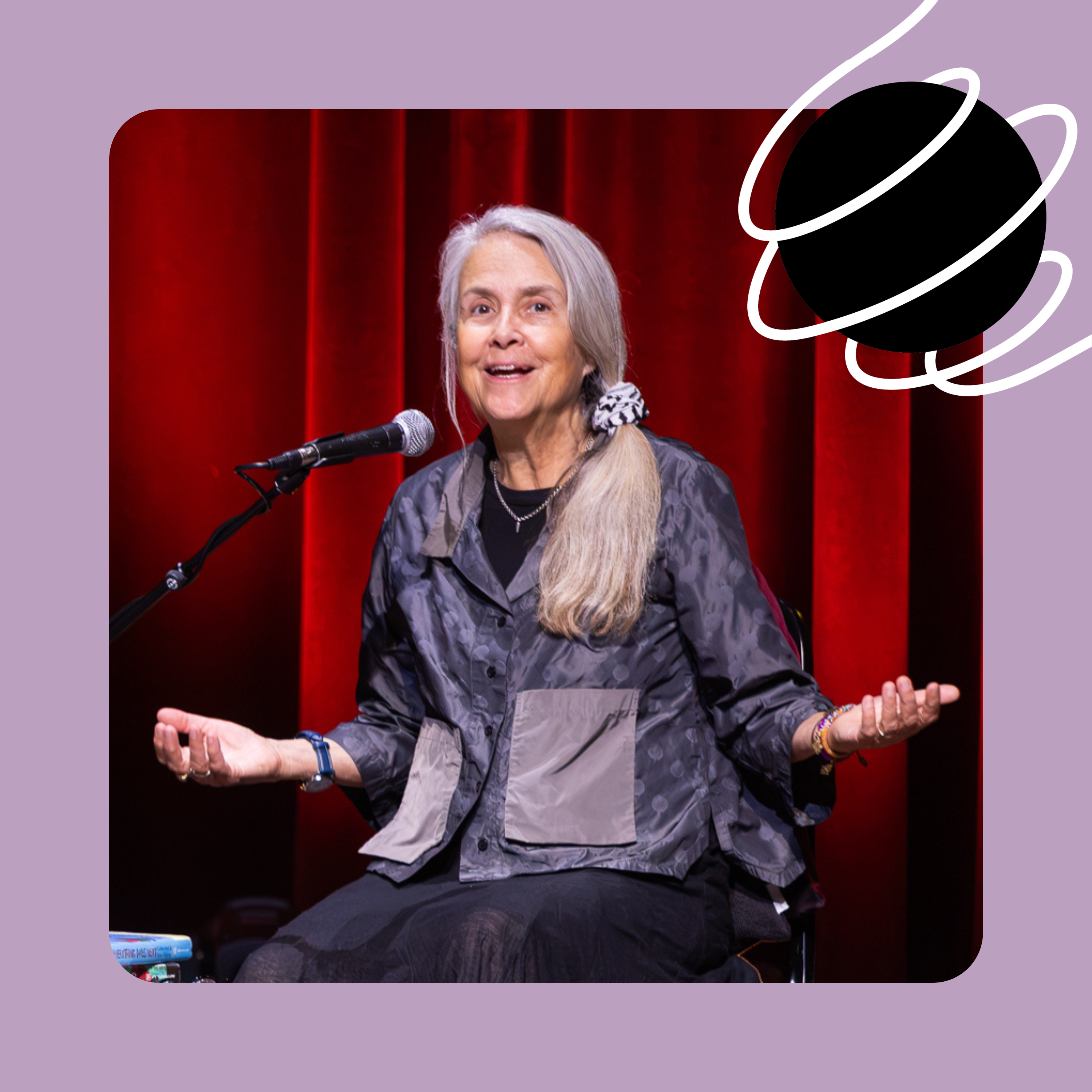 A photo of Naomi Shihab Nye speaking onstage.